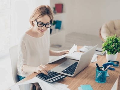Phillips & co | our services 1 An accountant preparing financial statements.