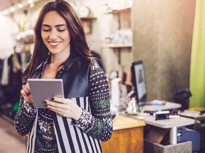 A business owner looking at her online receipts.